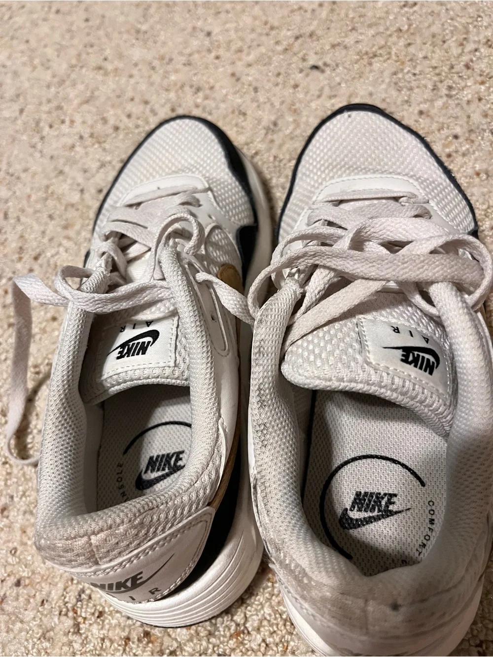 Nike White and Black Mesh Sneakers with Gold Swoosh